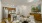 a large kitchen with dining table