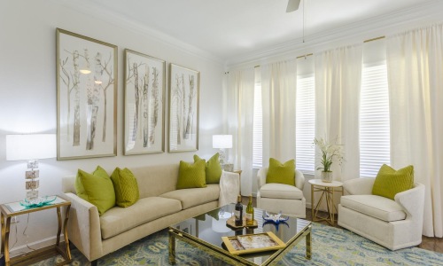 a living room with a couch and a table