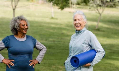a couple of women doing yoga