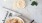 a plate of food and a cup of coffee