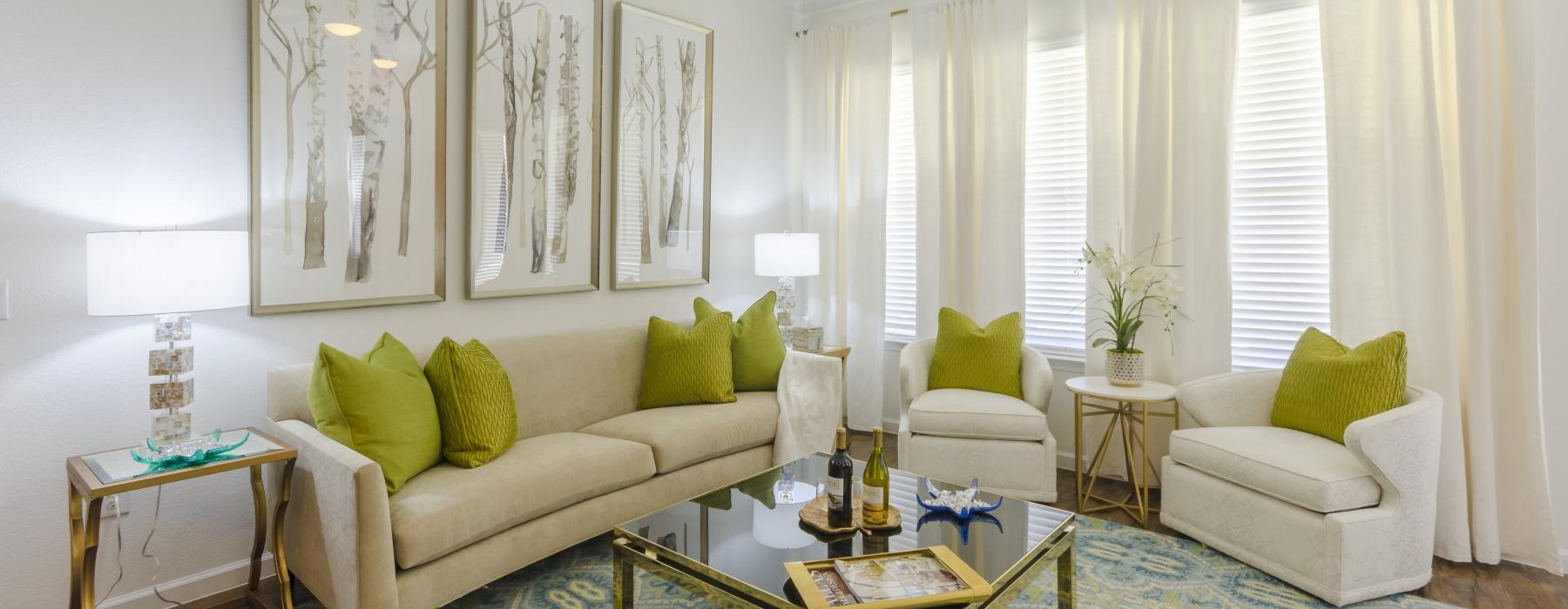 a living room with a couch and a table